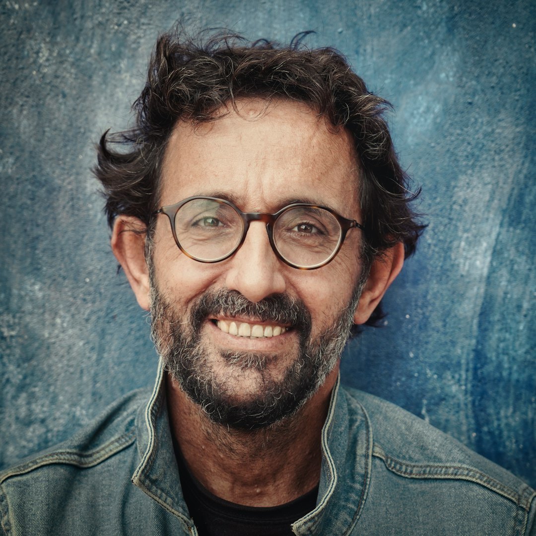 Professional portrait of male technical director with glasses